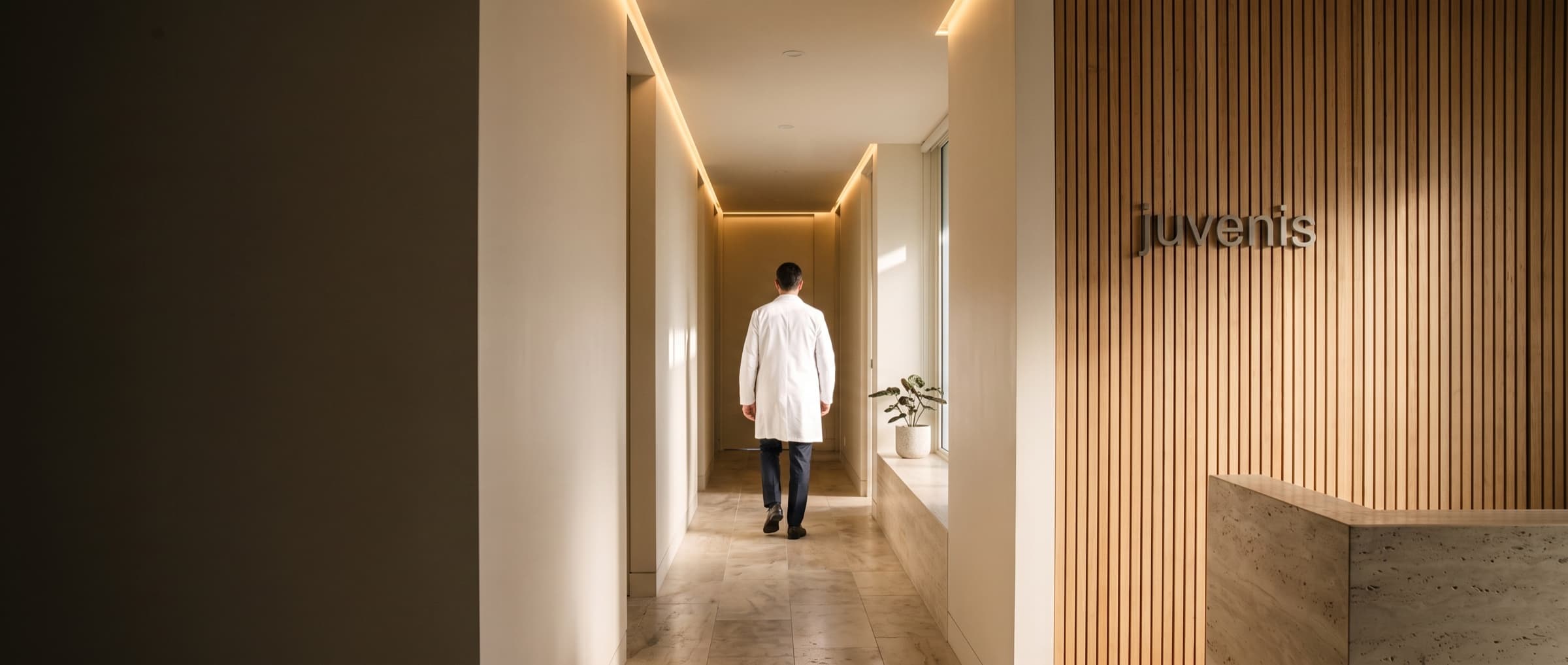 A doctor walking down the Juvenis clinic corridor